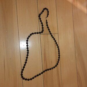 Black beaded glass necklace.